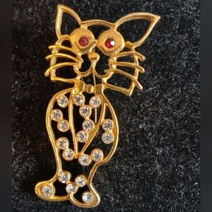 Elegant Gold Cat Brooch with Red and Clear Sparkling Accents